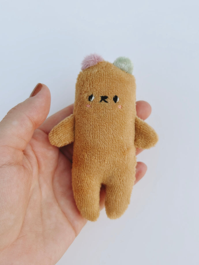 Macaron the baby bear with mint and lavender ears